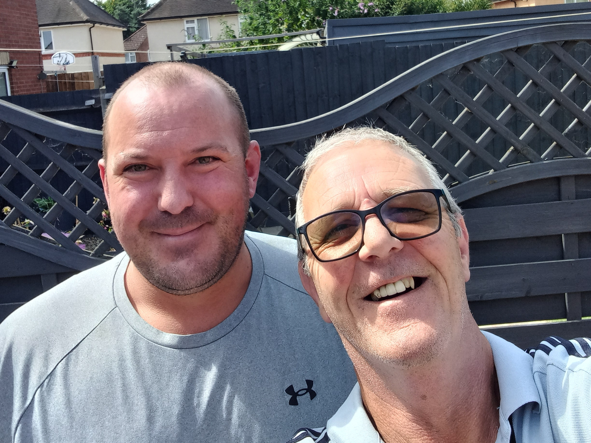 Chris and Brian in a garden